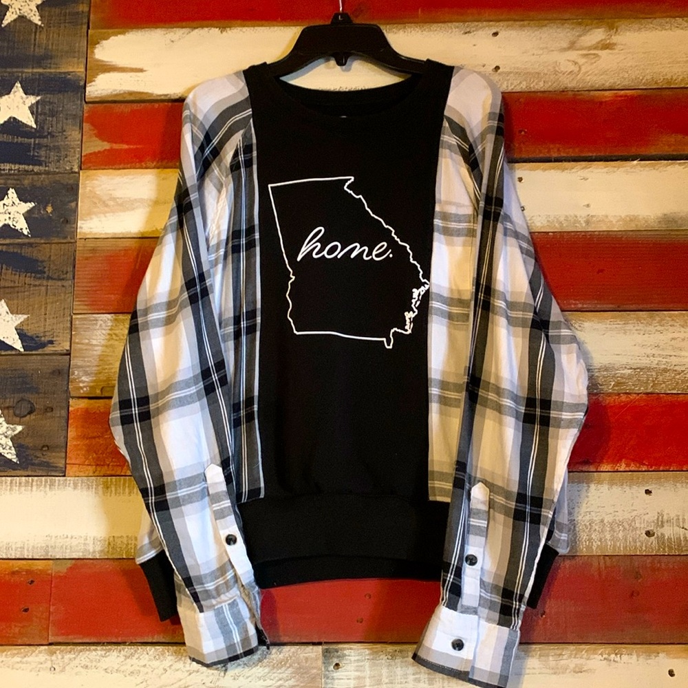 Women’s size Medium up-cycled crew neck sweatshirt.